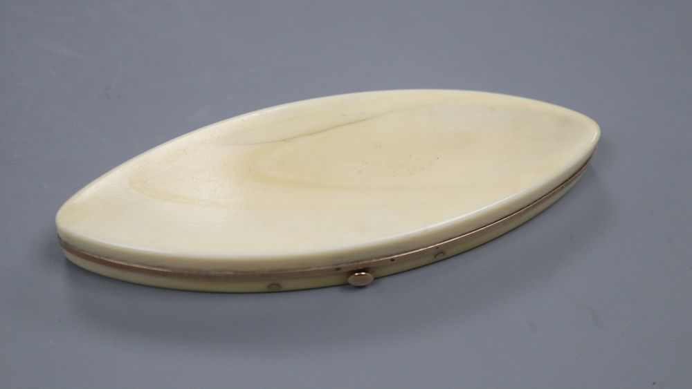 An oval ivory and yellow metal toothpick case